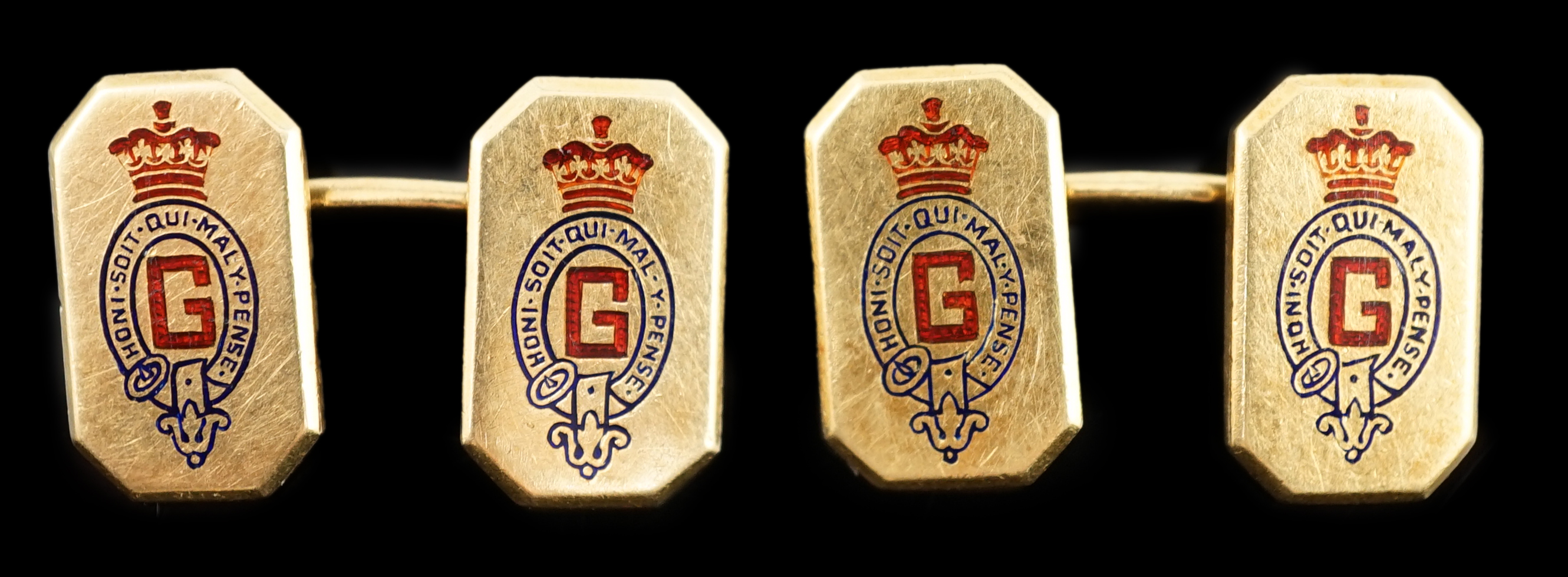 A pair of 1920's/1930's Cartier gold and two colour enamel rectangular Regimental cufflinks, with canted corners